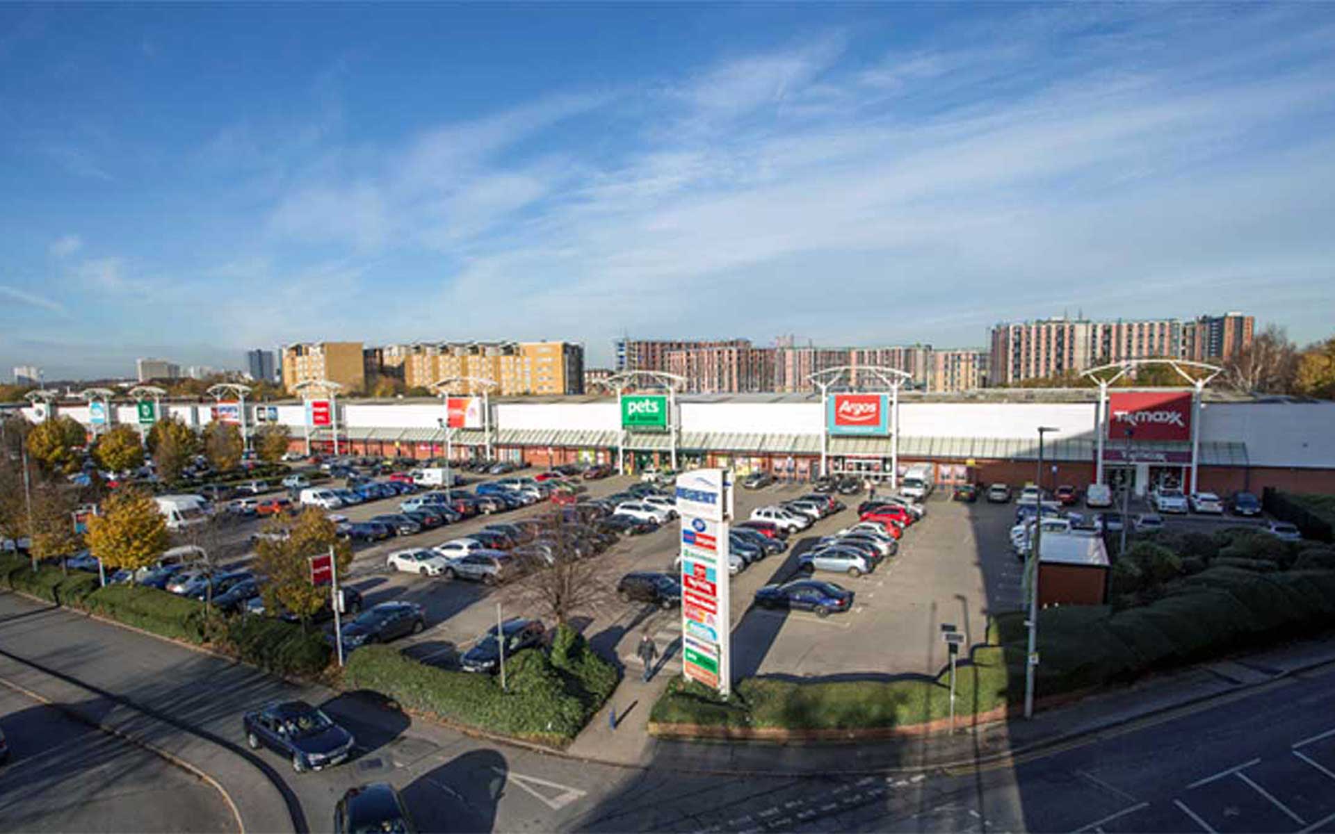 A retail park in Manchester owned by Henley Investments - European & USA Commercial Real Estate Investment