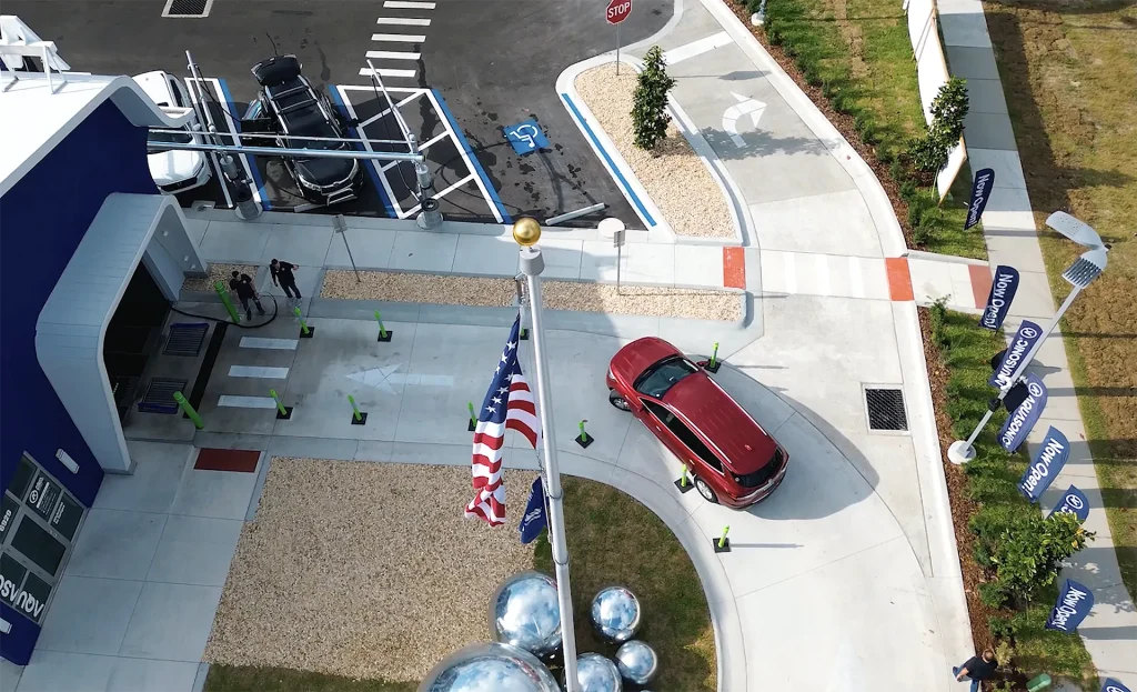 Designed for Convenience Aerial view of customers arriving at an AquaSonic express car wash location