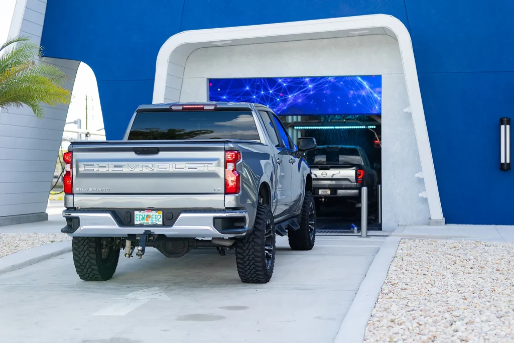 Fast, Efficient and Consistent Customers entering the AquaSonic automated car wash tunnel