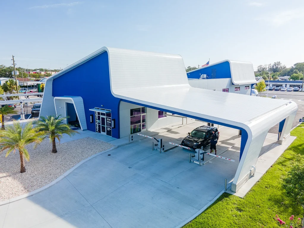 Purpose-Built Customer Experience Exterior view of an AquaSonic express car wash location in Florida