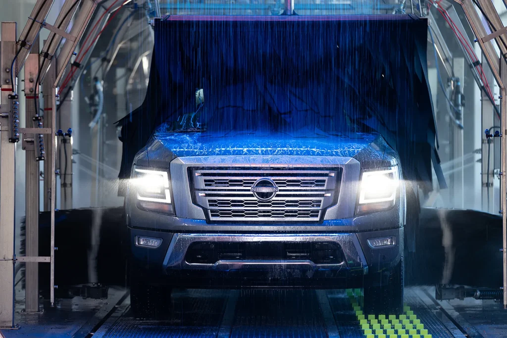 Technology-Enabled Express Car Wash Vehicle entering AquaSonic's technology-enabled express car wash tunnel in Florida