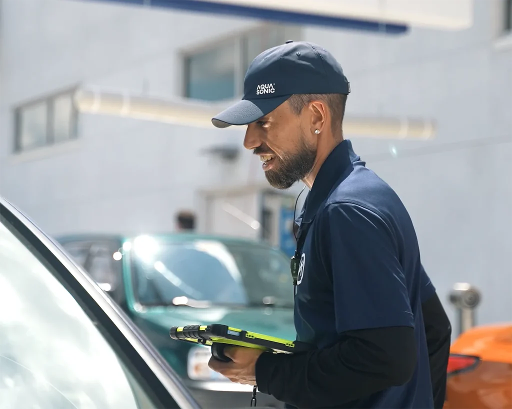 People Powered Performance AquaSonic team member supporting customers using digital operational tools