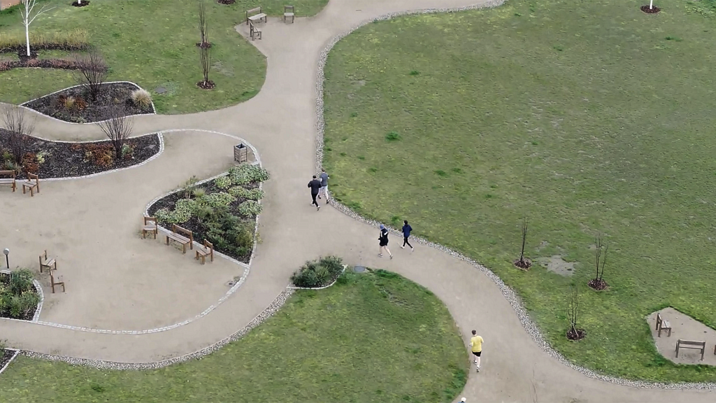Connected Green Spaces Aerial view of landscaped parkland with walking and running routes at Ebbsfleet Garden City