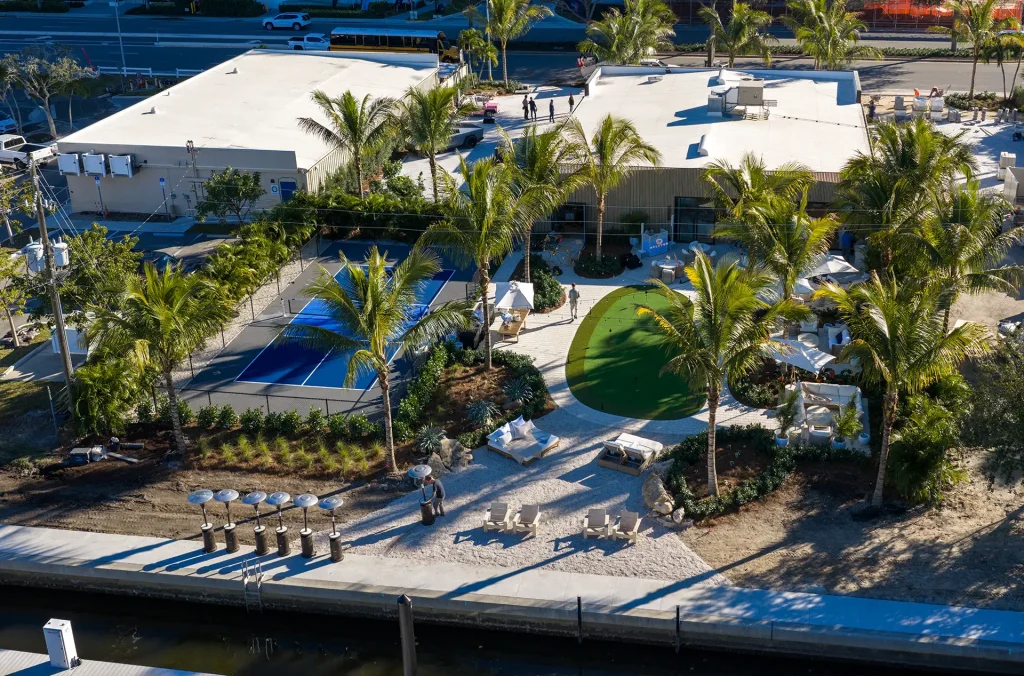 The Halcyon Waterfront Amenity Deck Waterfront amenity deck featuring pickleball courts, putting green and marina access